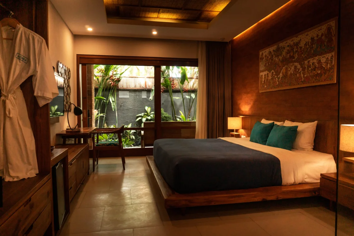 A warm resort bedroom in Bali, the stay that matches your pursuit